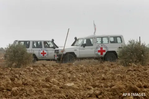 Vehicle of International Committee of the Red Cross (ICRC) driven, as the comittee assists Palestinian farmers to repair their fields that were devastated during the Israeli army summer's military offensive on the Gaza S...