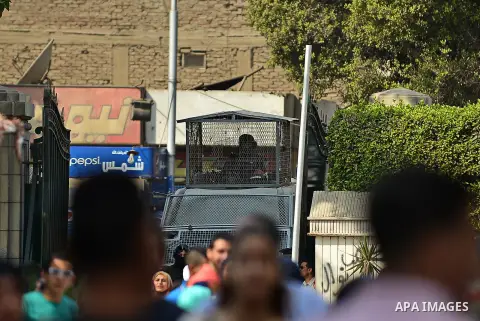 Egyptian students who support Muslim Brotherhood and ousted president Mohammed Morsi, shot slogans during a demonstration against military rule, at Cairo University, in Cairo, October 27, 2014. Anti-Coup students have la...