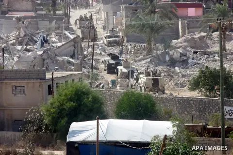Egyptian security forces take part in a military operation to demolish some buildings in the Egyptian city of Rafah near the border with southern Gaza Strip October 29, 2014, as Egypt began setting up a buffer zone along...