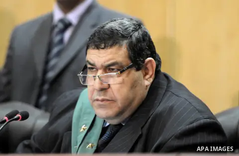 Egyptian judges attend the trial of Egypt's deposed Islamist president Mohamed Morsi in Cairo on October 29, 2014. Ousted president Mohamed Morsi’s 'Prison Break' trial which took place Wednesday has been postponed to No...