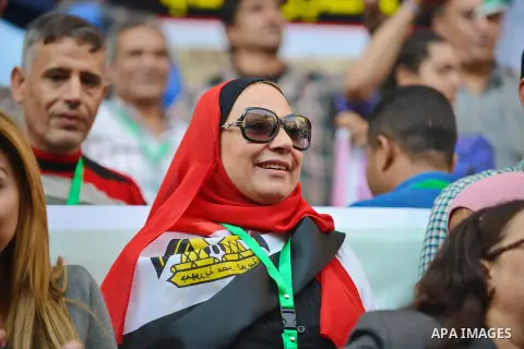 Egyptians hold placards and shout slogans during a rally to show solidarity with Egyptian army and President Abdel Fattah al-Sisi, outside the journalists syndicate, in Cairo on October 29, 2014, as Egypt began setting u...