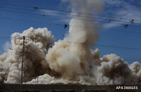 Smoke rises after a house was blown up during a military operation by Egyptian security forces in the Egyptian city of Rafah near the border with southern Gaza Strip October 30, 2014, as Egypt began setting up a buffer z...
