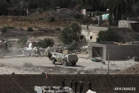 Egyptian soldiers take part in a military operation in the Egyptian city of Rafah, near the border with the southern Gaza Strip on October 30, 2014, as Egypt began setting up a buffer zone along the border with the Hamas...