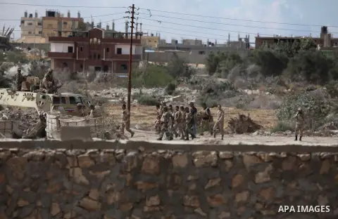 Egyptian soldiers take part in a military operation in the Egyptian city of Rafah, near the border with the southern Gaza Strip on October 30, 2014, as Egypt began setting up a buffer zone along the border with the Hamas...