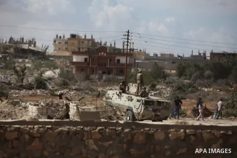 Egyptian soldiers take part in a military operation in the Egyptian city of Rafah, near the border with the southern Gaza Strip on October 30, 2014, as Egypt began setting up a buffer zone along the border with the Hamas...