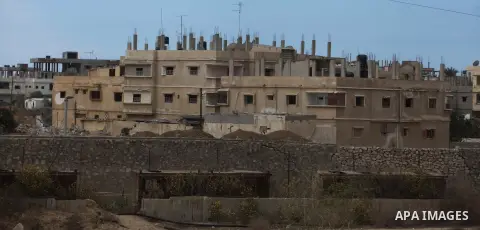 A house is seen before demolished by Egyptian security forces during a military operation in the Egyptian city of Rafah, near the border with the southern Gaza Strip on October 30, 2014, as Egypt began setting up a buffe...