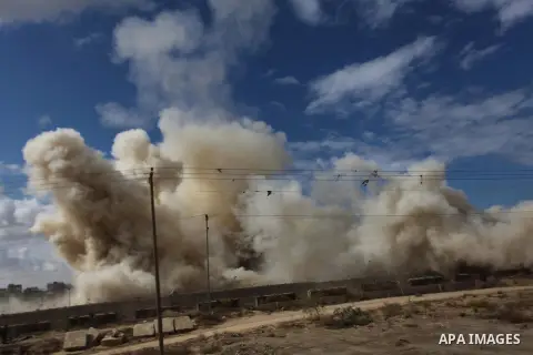 Smoke rises after a house was blown up during a military operation by Egyptian security forces in the Egyptian city of Rafah near the border with southern Gaza Strip October 30, 2014, as Egypt began setting up a buffer z...