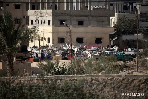 Egyptians inspect a house after it was demolished by Egyptian security forces during a military operation in the Egyptian city of Rafah near the border with southern Gaza Strip October 30, 2014, as Egypt began setting up...