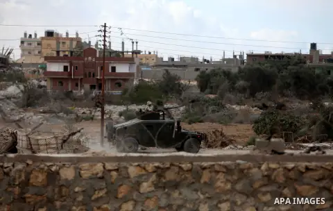 Egyptian soldiers take part in a military operation in the Egyptian city of Rafah, near the border with the southern Gaza Strip on October 30, 2014, as Egypt began setting up a buffer zone along the border with the Hamas...