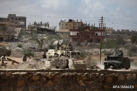 Egyptian soldiers take part in a military operation in the Egyptian city of Rafah, near the border with the southern Gaza Strip on October 30, 2014, as Egypt began setting up a buffer zone along the border with the Hamas...