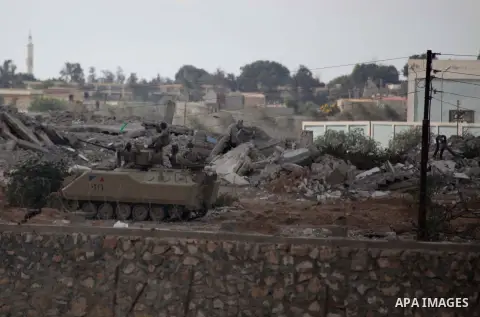 Egyptian soldiers take part in a military operation in the Egyptian city of Rafah, near the border with the southern Gaza Strip on October 30, 2014, as Egypt began setting up a buffer zone along the border with the Hamas...