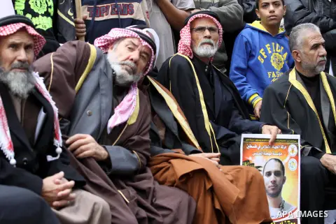 Palestinian Islamic Jihad movement supporters take part in a demonstration against Israeli restrictions at the Al-Aqsa Mosque compound, and in solidarity with the people in Jerusalem, in Gaza City October 31, 2014. Musli...