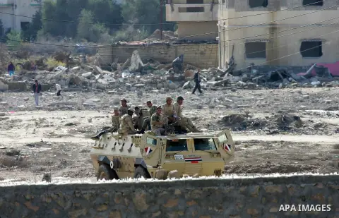 Egyptian soldiers take part in a military operation in the Egyptian city of Rafah, near the border with the southern Gaza Strip on Nov. 01, 2014, as Egypt began setting up a buffer zone along the border with the Hamas-ru...