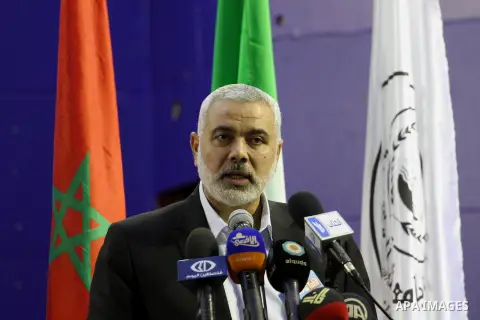 Senior Hamas leader Ismail Haniyeh speaks during a conference in Gaza city on Nov. 02, 2014. Photo by Mohammed Asad