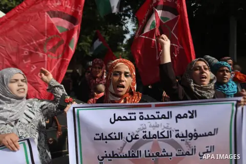 Palestinian supporters of the Democratic Front for the Liberation of Palestine hold banners during a demonstration in Gaza City to mark the anniversary of the Balfour Declaration on Nov. 02, 2014. The 1917 Balfour Declar...