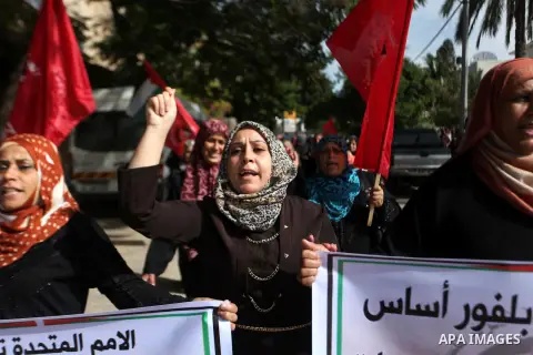 Palestinian supporters of the Democratic Front for the Liberation of Palestine hold banners during a demonstration in Gaza City to mark the anniversary of the Balfour Declaration on Nov. 02, 2014. The 1917 Balfour Declar...