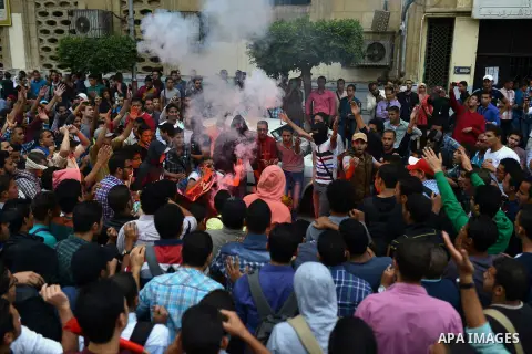 Egyptian students who support Muslim Brotherhood and ousted president Mohammed Morsi, shot slogans during a demonstration against military rule, in Cairo, Egypt, on Nov. 02, 2014. Photo by Amr Sayed