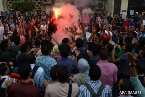 Egyptian students who support Muslim Brotherhood and ousted president Mohammed Morsi, shot slogans during a demonstration against military rule, in Cairo, Egypt, on Nov. 02, 2014. Photo by Amr Sayed