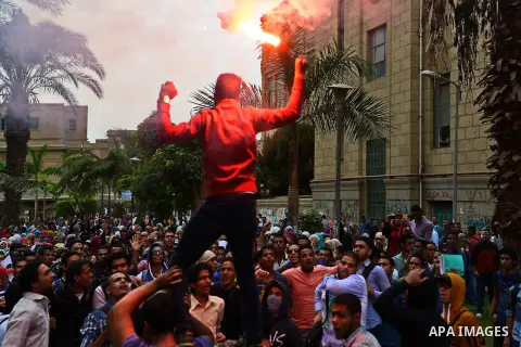 Egyptian students who support Muslim Brotherhood and ousted president Mohammed Morsi, shot slogans during a demonstration against military rule, in Cairo, Egypt, on Nov. 02, 2014. Photo by Amr Sayed