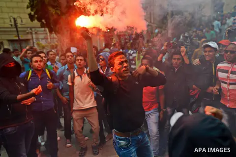 Egyptian students who support Muslim Brotherhood and ousted president Mohammed Morsi, shot slogans during a demonstration against military rule, in Cairo, Egypt, on Nov. 02, 2014. Photo by Amr Sayed