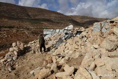 A Palestinian farmer inspects the remains of his house after it was demolished by Israeli authorities who said it was built without municipal permission in Khirbet Al-Taweel village near the West Bank City of Nablus Nov....