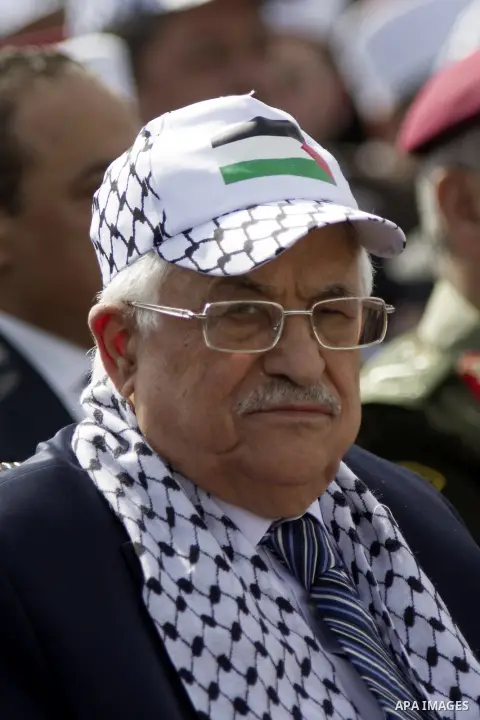 Palestinian president Mahmud Abbas looks on during a ceremony to mark the tenth anniversary of the death of late Palestinian leader Yasser Arafat in the West Bank city of Ramallah on November 11, 2014. Arafat died in a m...