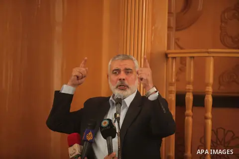 Senior leader of Hamas Ismail Haniyeh speaks during the funeral of a co-founder of the Hamas movement Mohammad Salih Taha in al-Bureij refugee camp in the central of Gaza strip, on Nov. 12, 2014. Taha, often called Abu A...