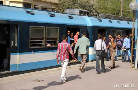 Egyptians wait at the Hilmiyat al-Zaytoun metro station, where a home-made bomb exploded, in Cairo November 13, 2014. A sonic device has caused at least 16 injuries after detonating at Helmeyet al-Zeitoun metro station i...