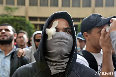 Egyptian students take part in a demonstration to commemorate the 3rd anniversary of deadly Mohamed Mahmoud clashes, at Cairo University on November 19, 2014. A number of political parties marched to commemorate the Nov....