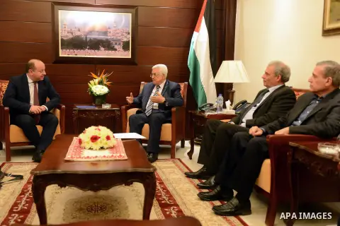 Palestinian President Mahmoud Abbas meets with John Gatt-Rutter, the EU representative to the Palestinian territories, at Abbas's headquarter in the West Bank city of Ramallah, November 19, 2014. Photo by Thaer Ganaim