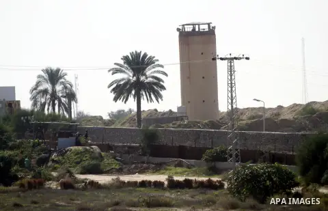 An Egyptian military watchtower is seen during a military operation by Egyptian security forces in the Egyptian city of Rafah near the border with southern Gaza Strip on November 20, 2014. Egypt is set to expand the buff...