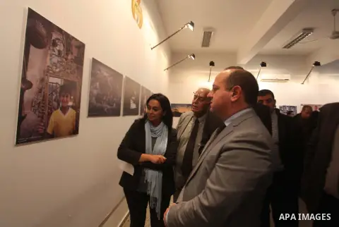 Director of UNRWA operations, Robert Turner, and European Union representative John Gatt-Rutter, attend a photo gallery organized by the Relief and Works Agency "UNRWA", in Gaza city on November. 26, 2014. Photo by Ashra...