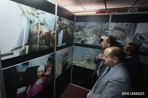 European Union representative John Gatt-Rutter, attends a photo gallery, in Gaza city on November. 26, 2014. Photo by Ashraf Amra