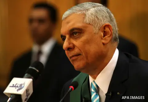 An Egyptian Judge Mahmoud Kamel Rashedy, attends the trial of Egypt's former president Hosni at the court in Cairo, Egypt, Nov. 29, 2014 after a court dismissed a murder charge against the ousted leader over the deaths o...
