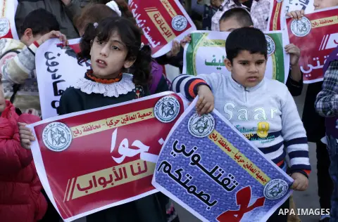 Palestinian disabilities participate in the race wheelchairs, during a rally marking the International Day of Persons with Disabilities in Rafah in the southern in Gaza strip on Dec. 03, 2014. Photo by Abed Rahim Khatib