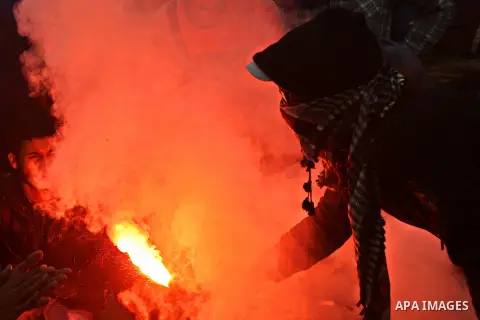 Egyptian students who are members in Students Against the Coup group (SAC), take part in a demonstration against the Cairo Criminal Court's decision to drop charges against former president Hosni Mubarak, at Cairo Univer...