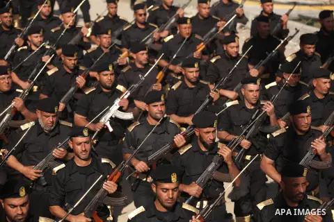 Members of Palestinian security forces march during a graduation ceremony in Gaza City December 4, 2014. Photo by Ashraf Amra