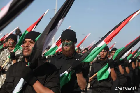 Members of Palestinian security forces march during a graduation ceremony in Gaza City December 4, 2014. Photo by Ashraf Amra