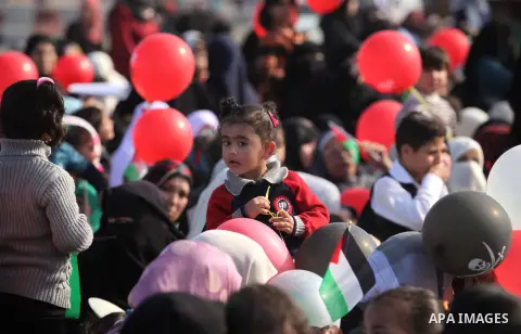 Palestinians attend a graduation ceremony for Members of Palestinian security forces in Gaza City December 4, 2014. Photo by Ashraf Amra