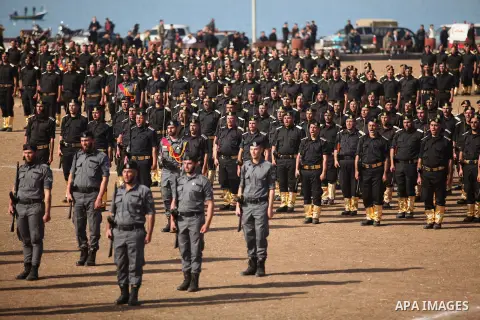Members of Palestinian security forces march during a graduation ceremony in Gaza City December 4, 2014. Photo by Ashraf Amra