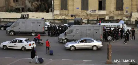 Egyptian police deploy on Abdel Moneim Riad Square in the capital Cairo on December 5, 2014, during a demonstration against a court's decision to drop a murder charge against ousted president Hosni Mubarak. A Cairo court...