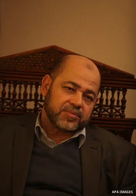 Hamas political leader Moussa Abu Marzouk attends a press conference of the union staff, in Gaza city, on December 6, 2014. Photo by Ashraf Amra
