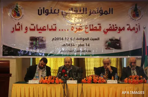 Hamas political leader Moussa Abu Marzouk speaks during a press conference of the union staff, in Gaza city, on December 6, 2014. Photo by Ashraf Amra