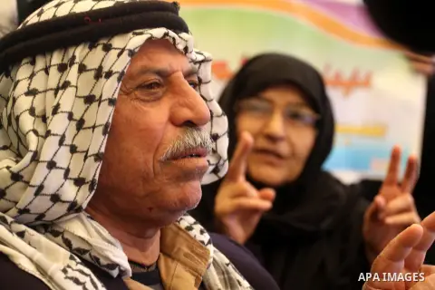 Palestinians take part a protest demanding the release of their relatives prisoners held in Israeli jails, in front of the Red Cross office in Gaza City, on Dec. 08, 2014. Photo by Mohammed Asad