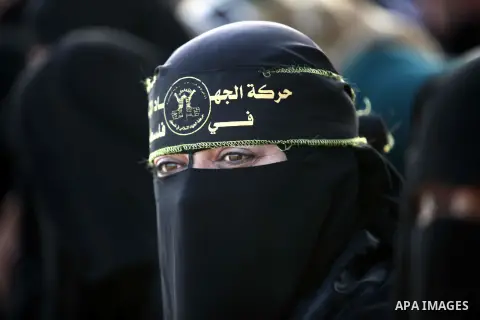 Palestinian supporters of Islamic Jihad movement attend a military training exercise, in Nuseirat, in the center of Gaza Strip, December 11, 2014. Hamas says a senior U.N. envoy held a rare meeting with the No. 2 in the...