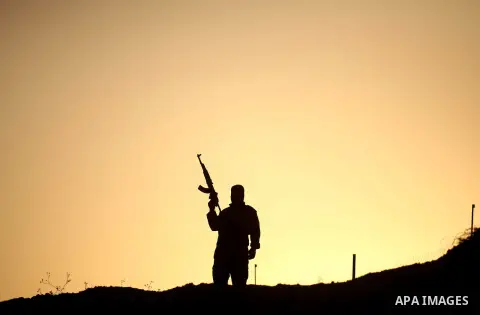 A Palestinian militant from the al-Quds brigade, the armed wing of Islamic Jihad movement, takes part in a training exercise, in Nuseirat, in the center of Gaza Strip, December 11, 2014. Hamas says a senior U.N. envoy he...
