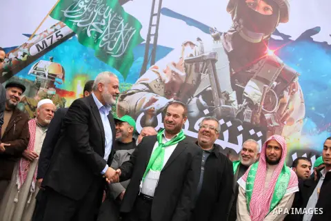 Senior Hamas leader Ismail Haniyeh, takes part in a rally ahead of the 27th anniversary of the movement founding, in Jabaliya in the northern Gaza Strip December 12, 2014. Photo by Ashraf Amra