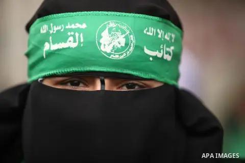 Palestinians Hamas supporters take part in a rally ahead of the 27th anniversary of the movement founding, in Jabaliya in the northern Gaza Strip December 12, 2014. Photo by Ashraf Amra