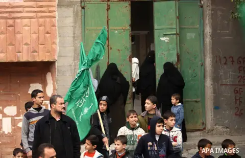 Palestinians Hamas supporters take part in a rally ahead of the 27th anniversary of the movement founding, in Jabaliya in the northern Gaza Strip December 12, 2014. Photo by Ashraf Amra