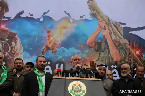 Senior Hamas leader Ismail Haniyeh, speaks during a rally ahead of the 27th anniversary of the movement founding, in Jabaliya in the northern Gaza Strip December 12, 2014. Photo by Ashraf Amra